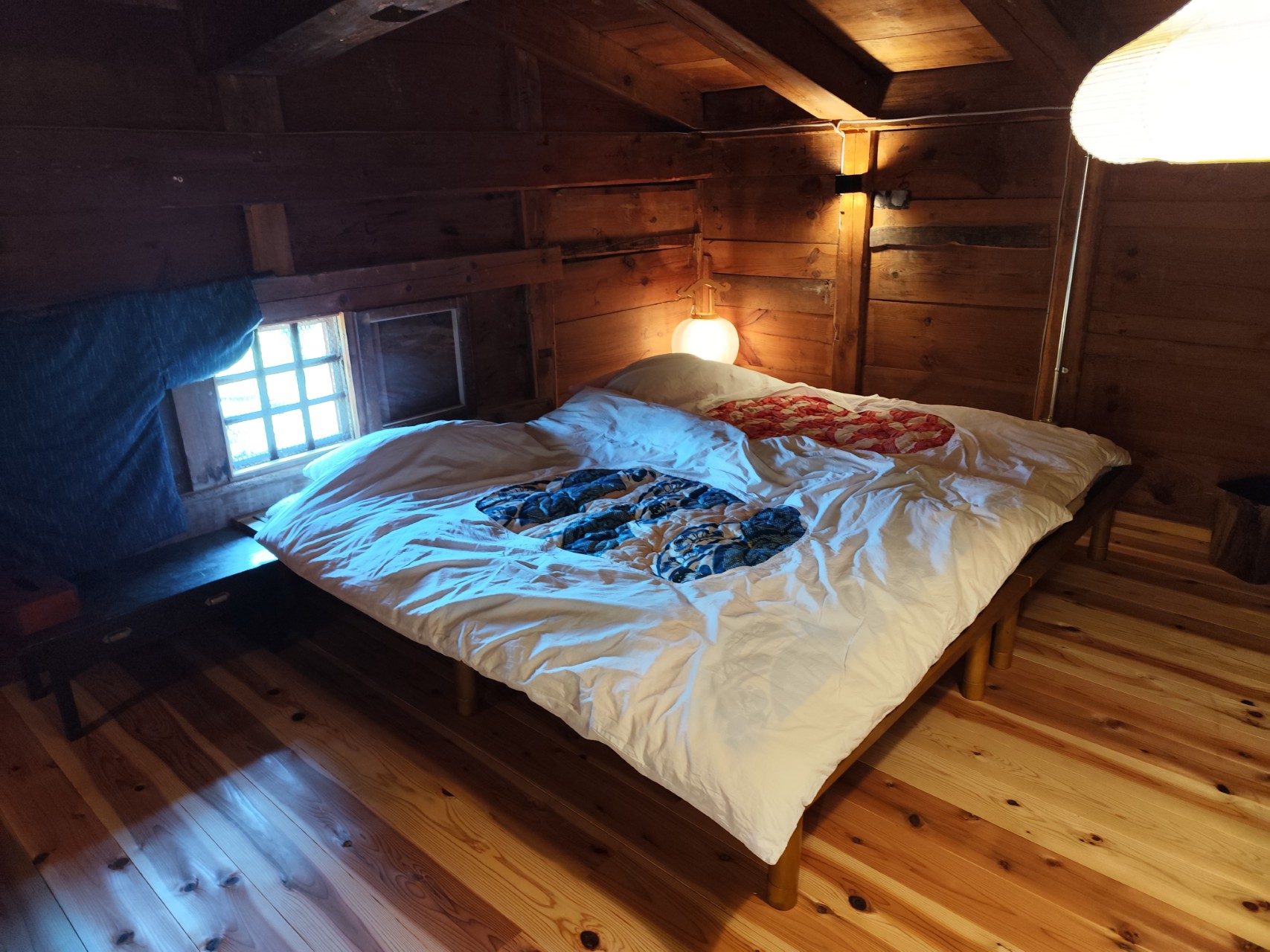 Two loft beds pushed together as a double